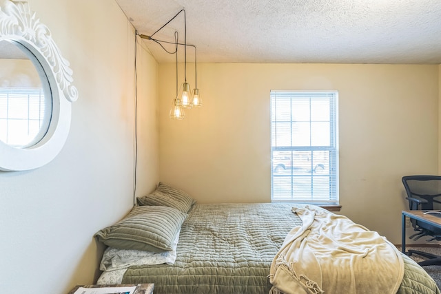 bedroom with a textured ceiling