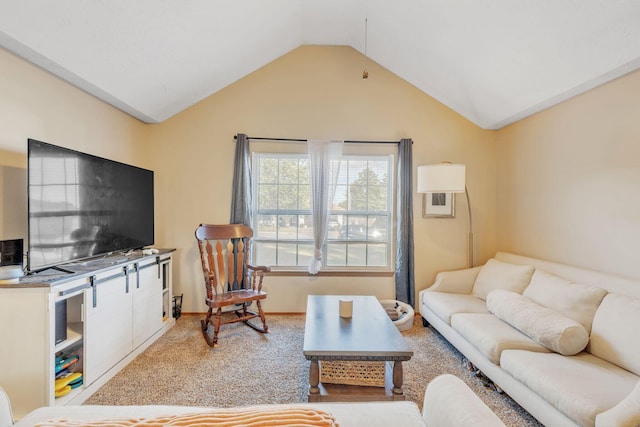 living room with light hardwood / wood-style floors and lofted ceiling