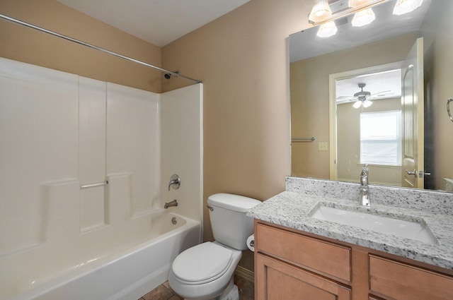 bathroom featuring tub / shower combination, toilet, vanity, and a ceiling fan