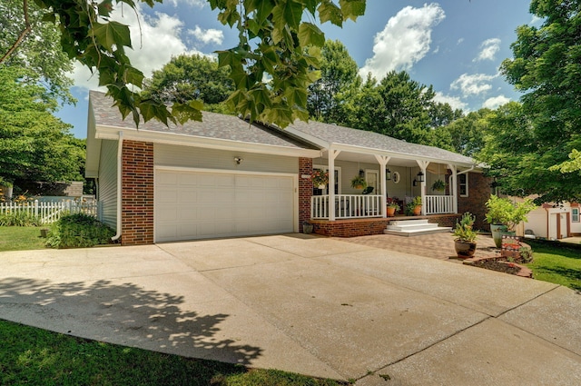 ranch-style home featuring a porch and a garage