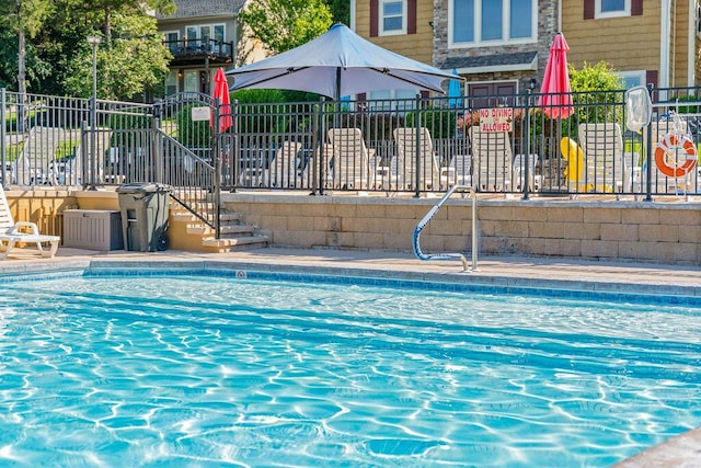 community pool with fence
