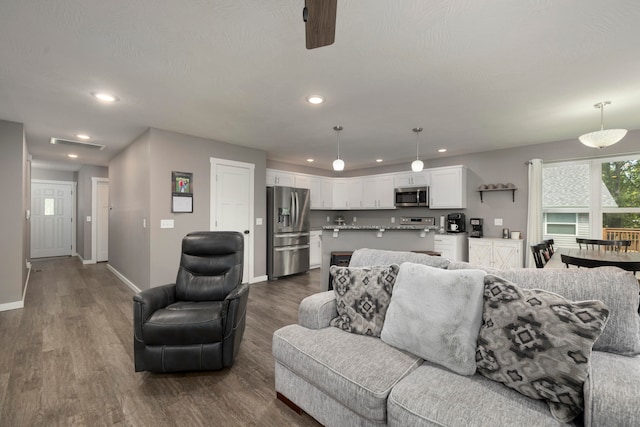 living room with dark wood-type flooring