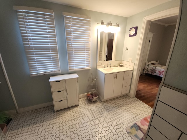 bathroom with vanity and hardwood / wood-style flooring