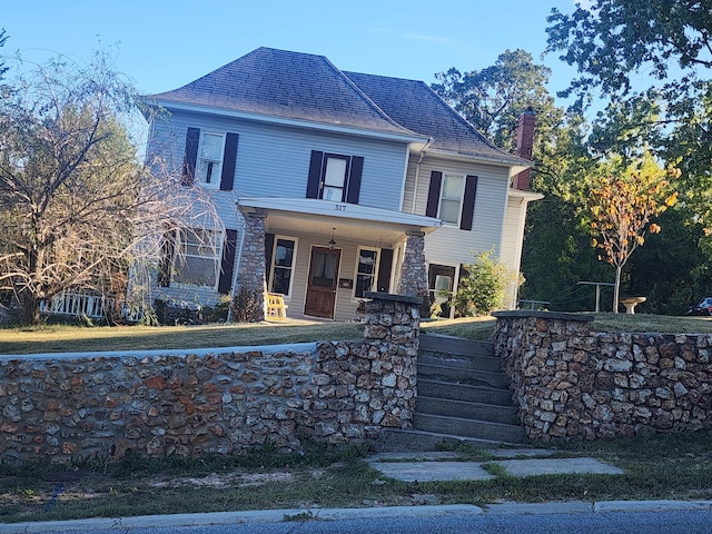 front of property featuring a porch