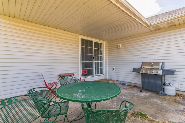 view of patio with a grill