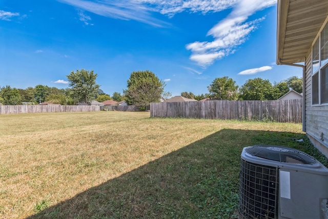 view of yard featuring cooling unit and fence private yard