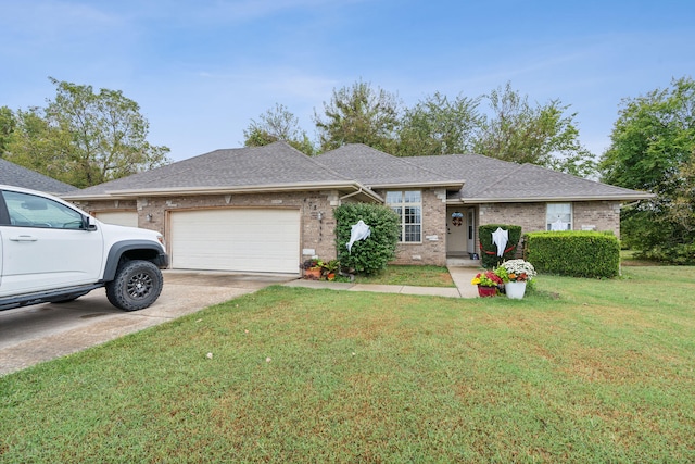 single story home featuring a front yard and a garage