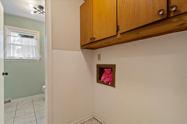 washroom featuring light tile patterned floors