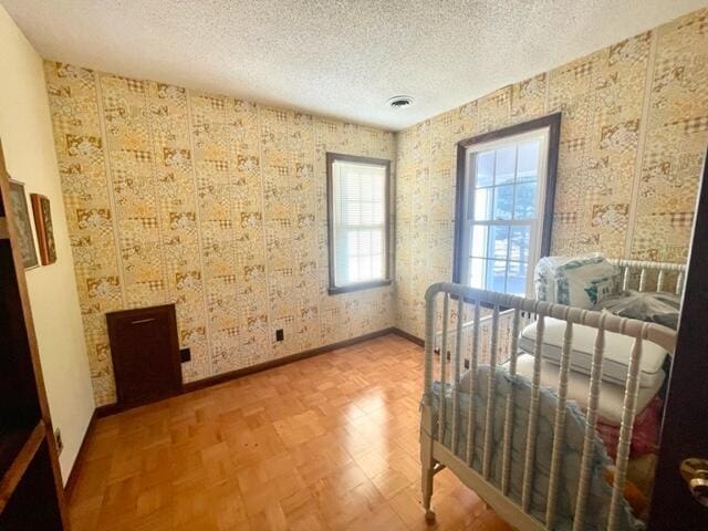 bedroom with a textured ceiling