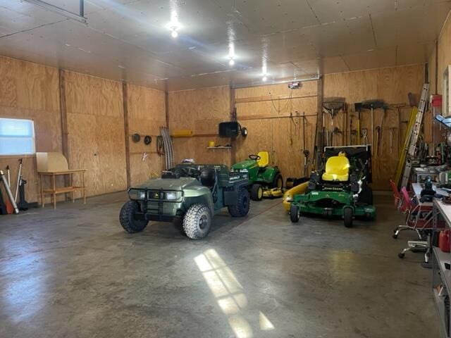 garage with wood walls