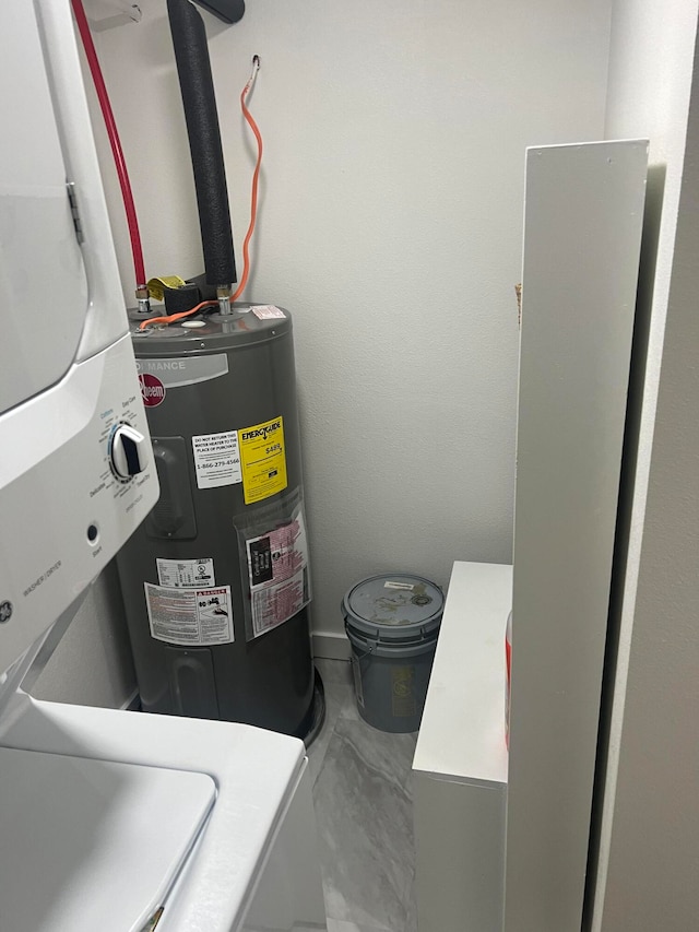 utility room featuring electric water heater