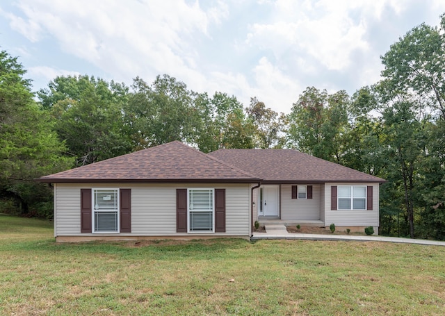 ranch-style house featuring a front lawn