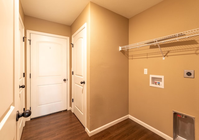 clothes washing area featuring dark wood-type flooring, hookup for a washing machine, and electric dryer hookup