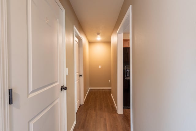 hallway featuring hardwood / wood-style flooring