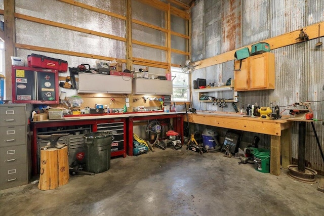 garage with a workshop area