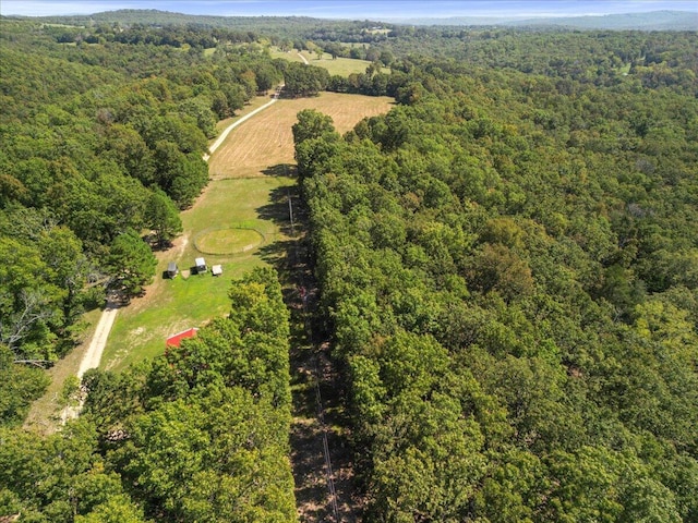 bird's eye view featuring a view of trees