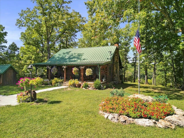 view of yard with covered porch