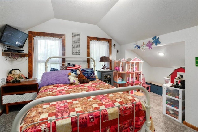 bedroom with carpet floors, vaulted ceiling, and a textured ceiling