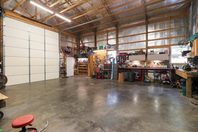 garage with a workshop area