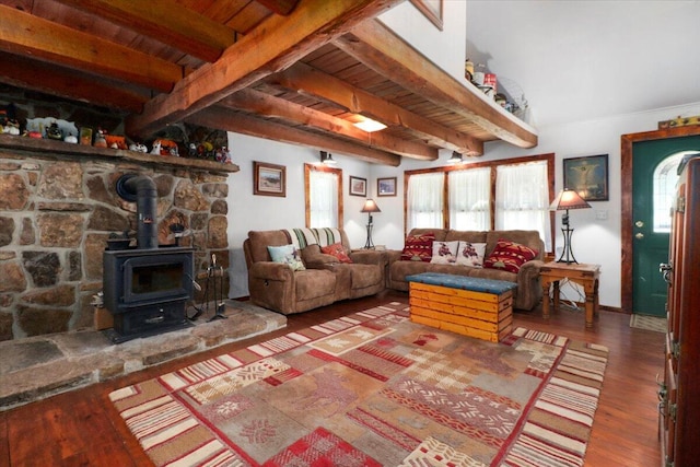 living room with wooden ceiling, hardwood / wood-style floors, beamed ceiling, and a wood stove