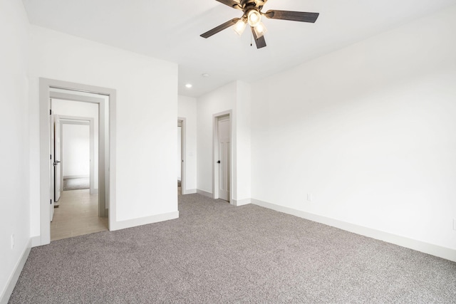 unfurnished bedroom with ceiling fan, carpet floors, recessed lighting, and baseboards