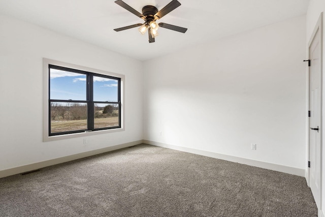 unfurnished room with a ceiling fan, baseboards, visible vents, and carpet flooring