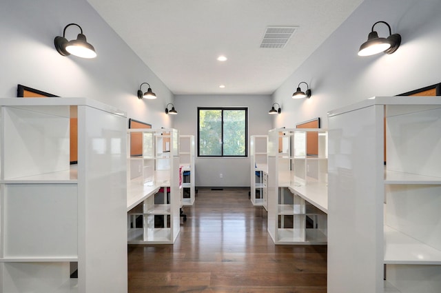 bathroom with hardwood / wood-style flooring