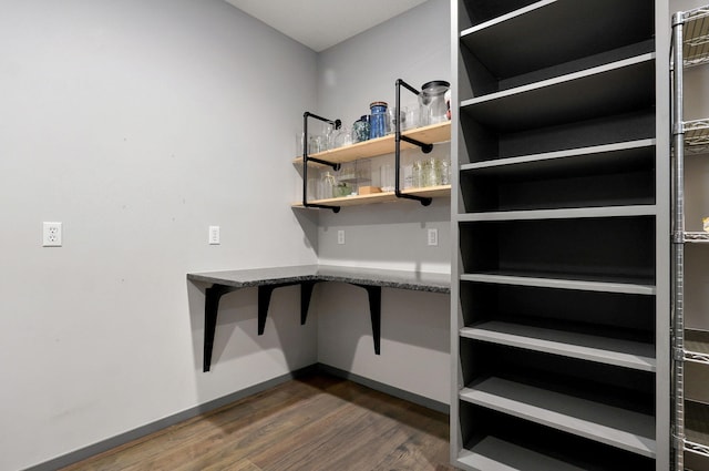 interior space with dark hardwood / wood-style flooring