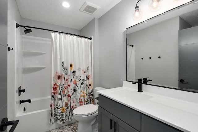 full bathroom with vanity, a textured ceiling, toilet, and shower / bathtub combination with curtain