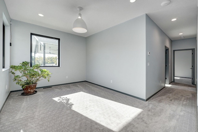 view of carpeted spare room