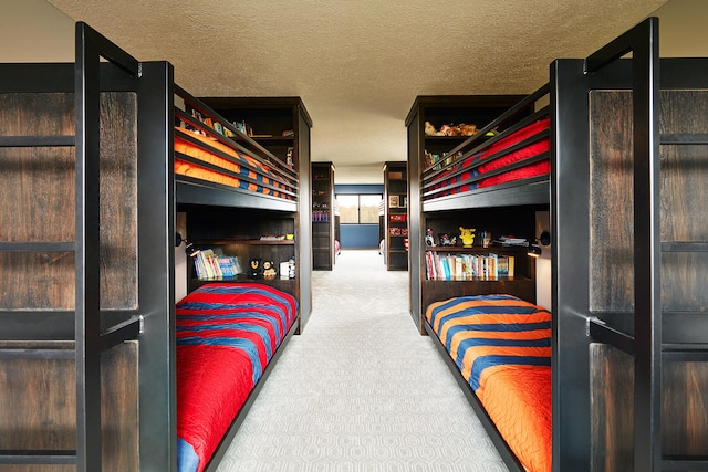 carpeted bedroom with a textured ceiling