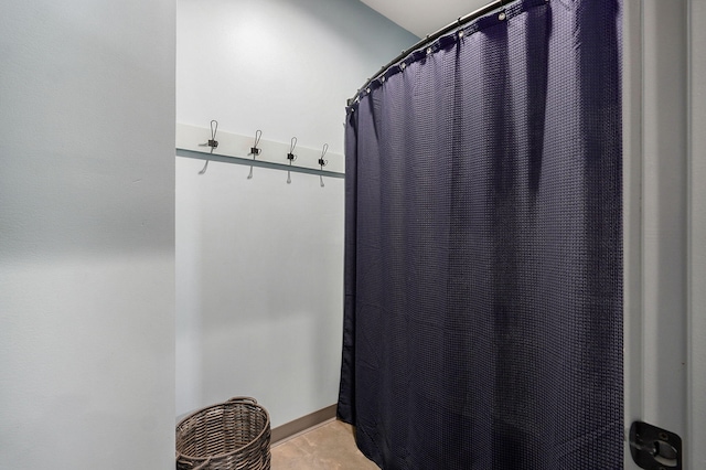 bathroom featuring walk in shower