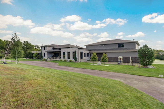 view of front of home with a front lawn