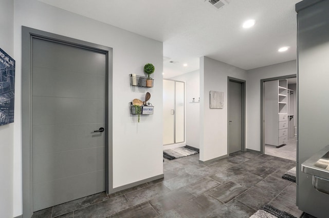 interior space with a textured ceiling