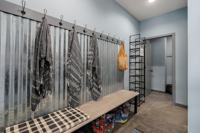 mudroom with concrete floors