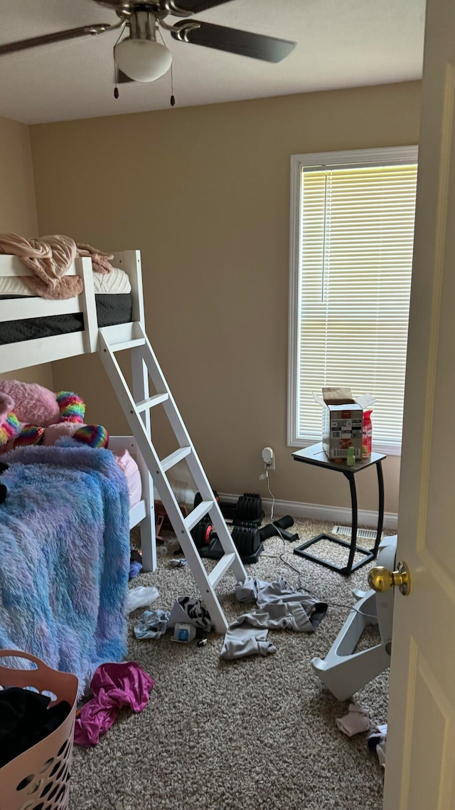 carpeted bedroom featuring ceiling fan