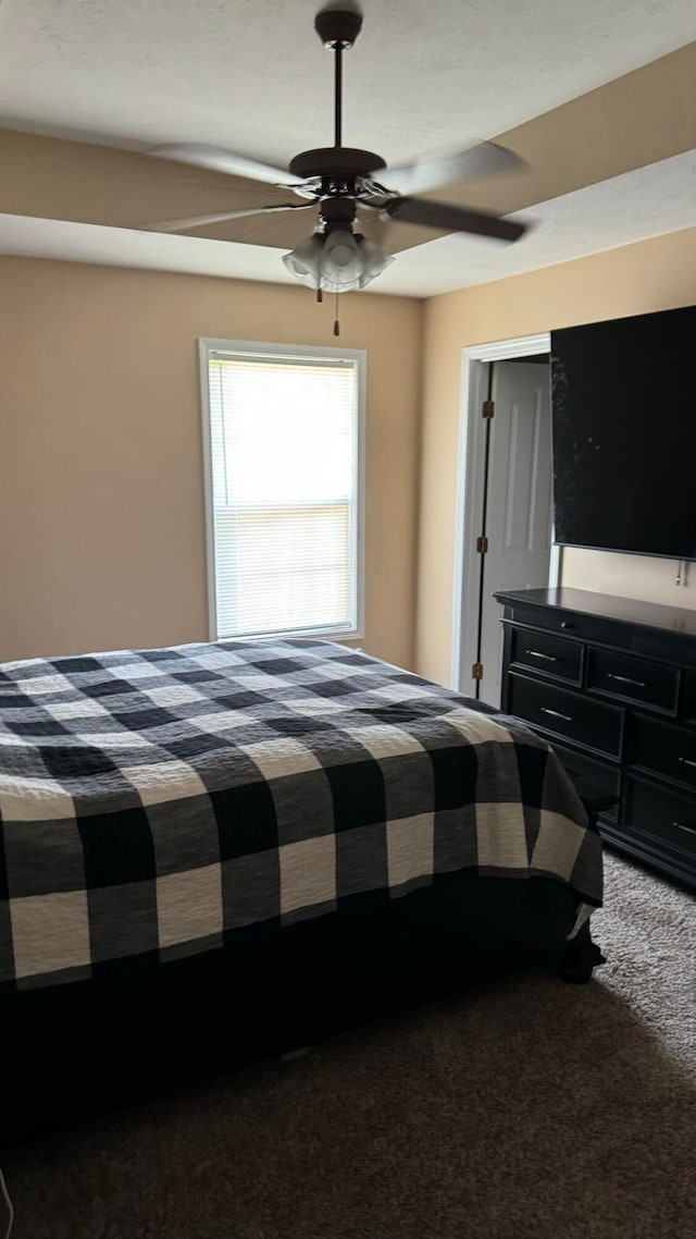 bedroom featuring carpet and ceiling fan