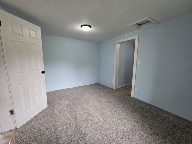 empty room featuring carpet floors