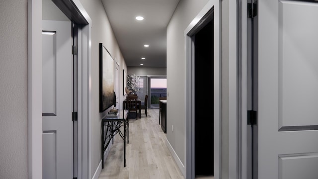 corridor with recessed lighting and light wood-style floors