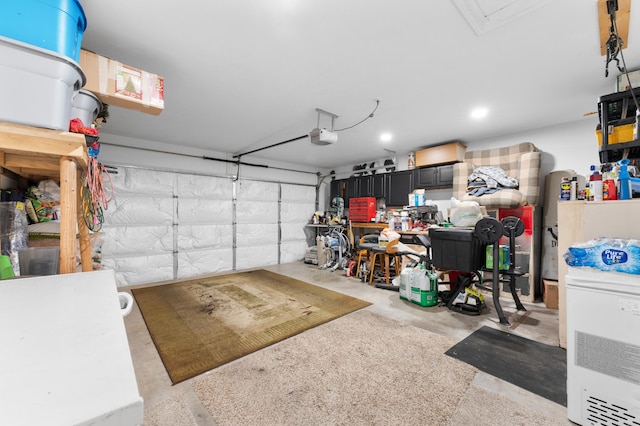 garage featuring a garage door opener