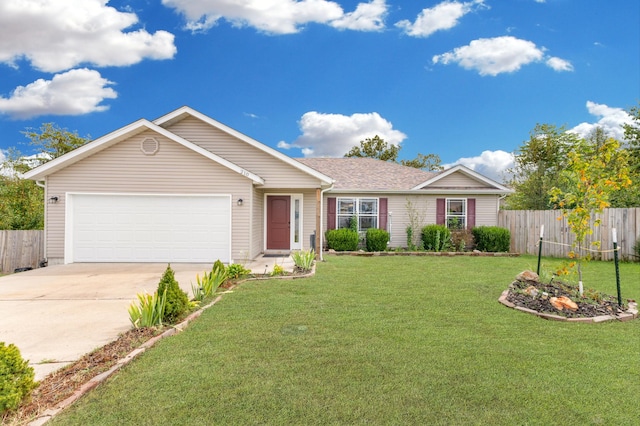 single story home featuring a garage and a front lawn