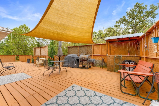 deck featuring grilling area