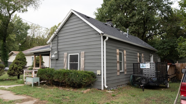 view of property exterior featuring a yard