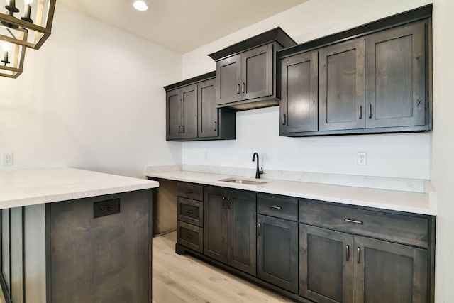 kitchen featuring sink and light hardwood / wood-style floors