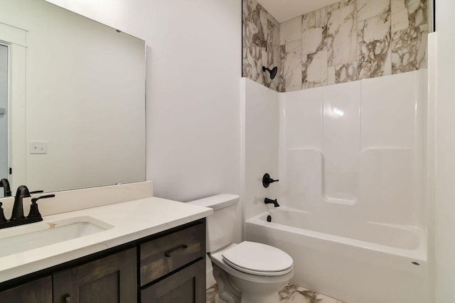 full bathroom with washtub / shower combination, vanity, and toilet