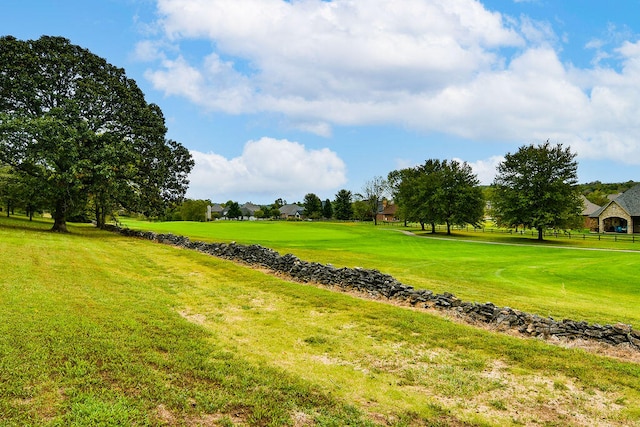 view of community featuring a yard