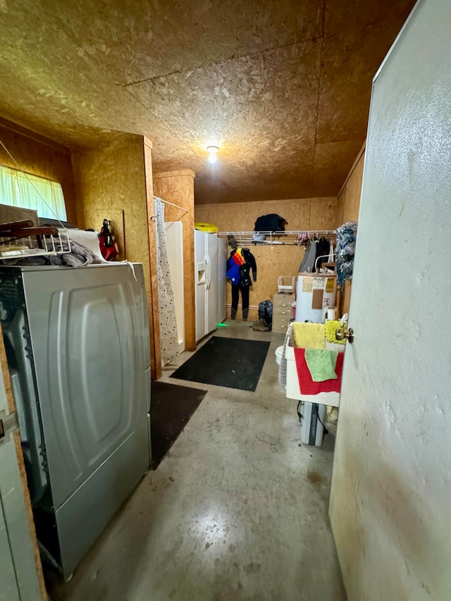 clothes washing area with washer / clothes dryer