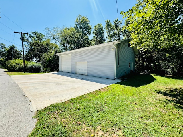 garage with a lawn