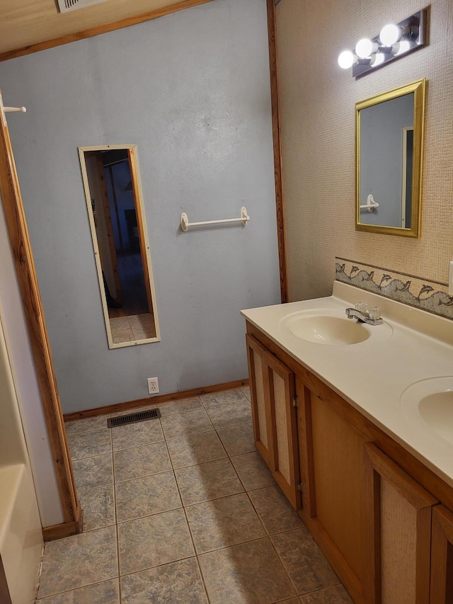 bathroom with vanity and tile patterned floors