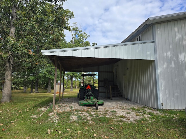 view of parking / parking lot with a yard